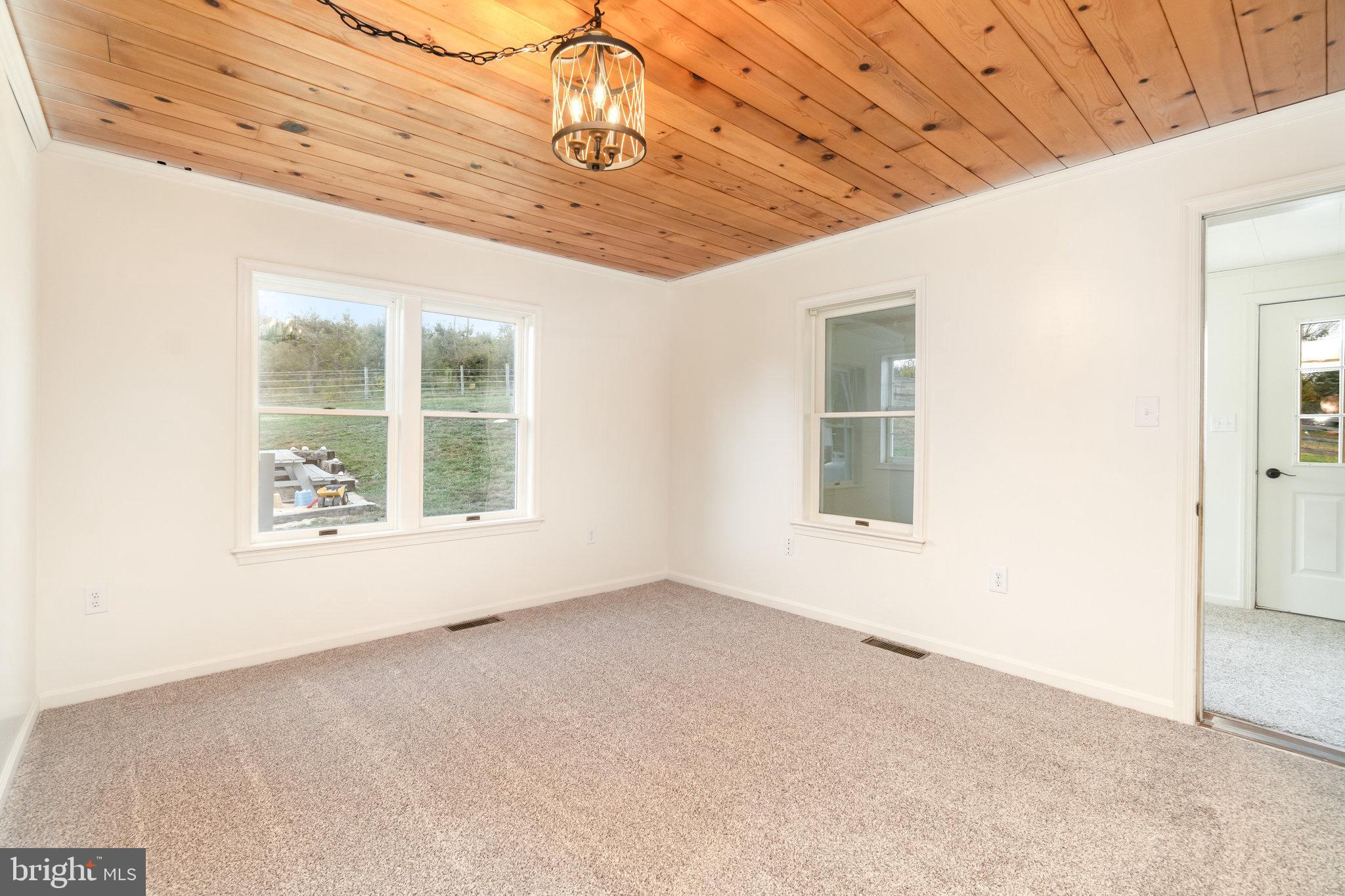 502 Celebration Hill Road Biglerville, PA 17307 - Photo 16 of 67 an empty room with windows