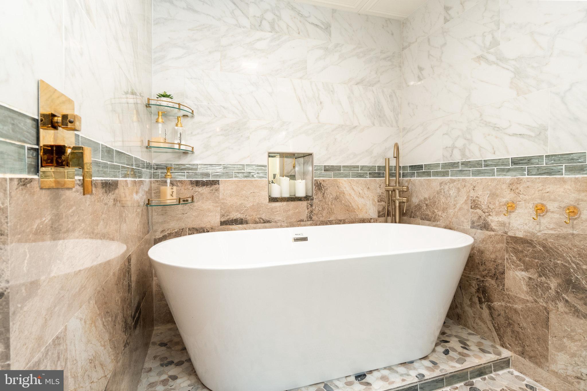 502 Celebration Hill Road Biglerville, PA 17307 - Photo 22 of 67 a white bath tub sitting next to a white house