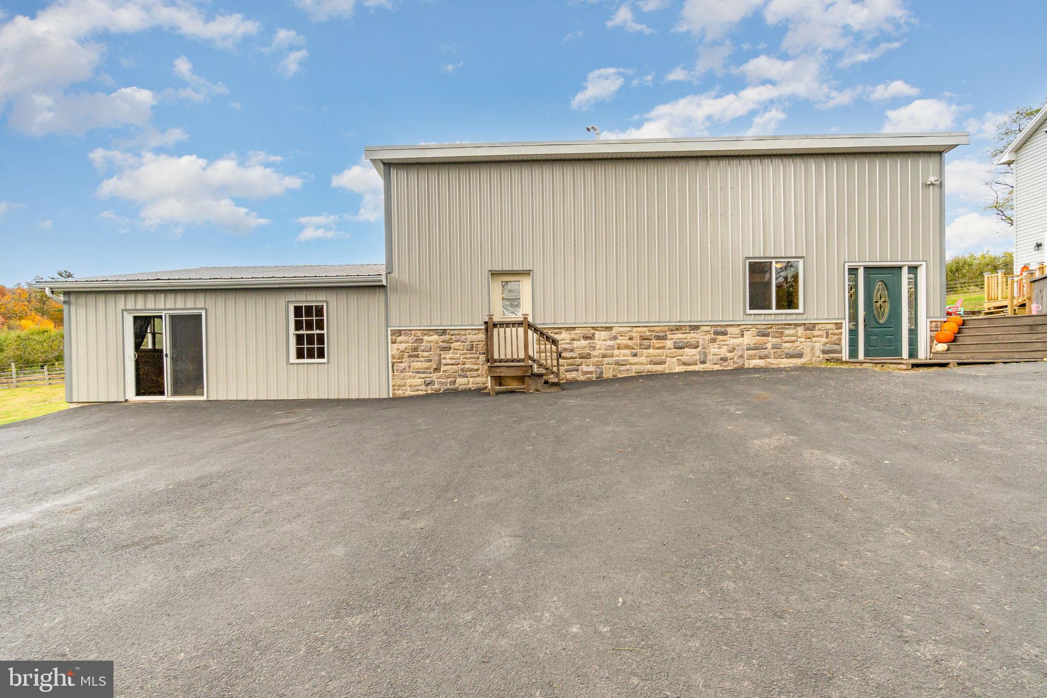 502 Celebration Hill Road Biglerville, PA 17307 - Photo 41 of 67 a view of an empty room with a fireplace