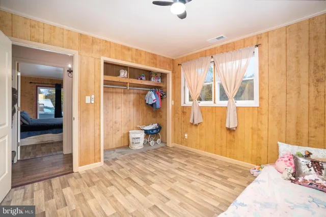 a picture of a bench in front of a door