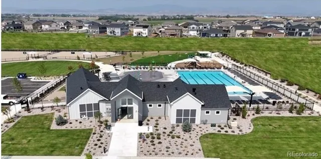 an aerial view of a house with a garden
