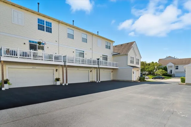 a view of a kitchen with a sink and cabinets