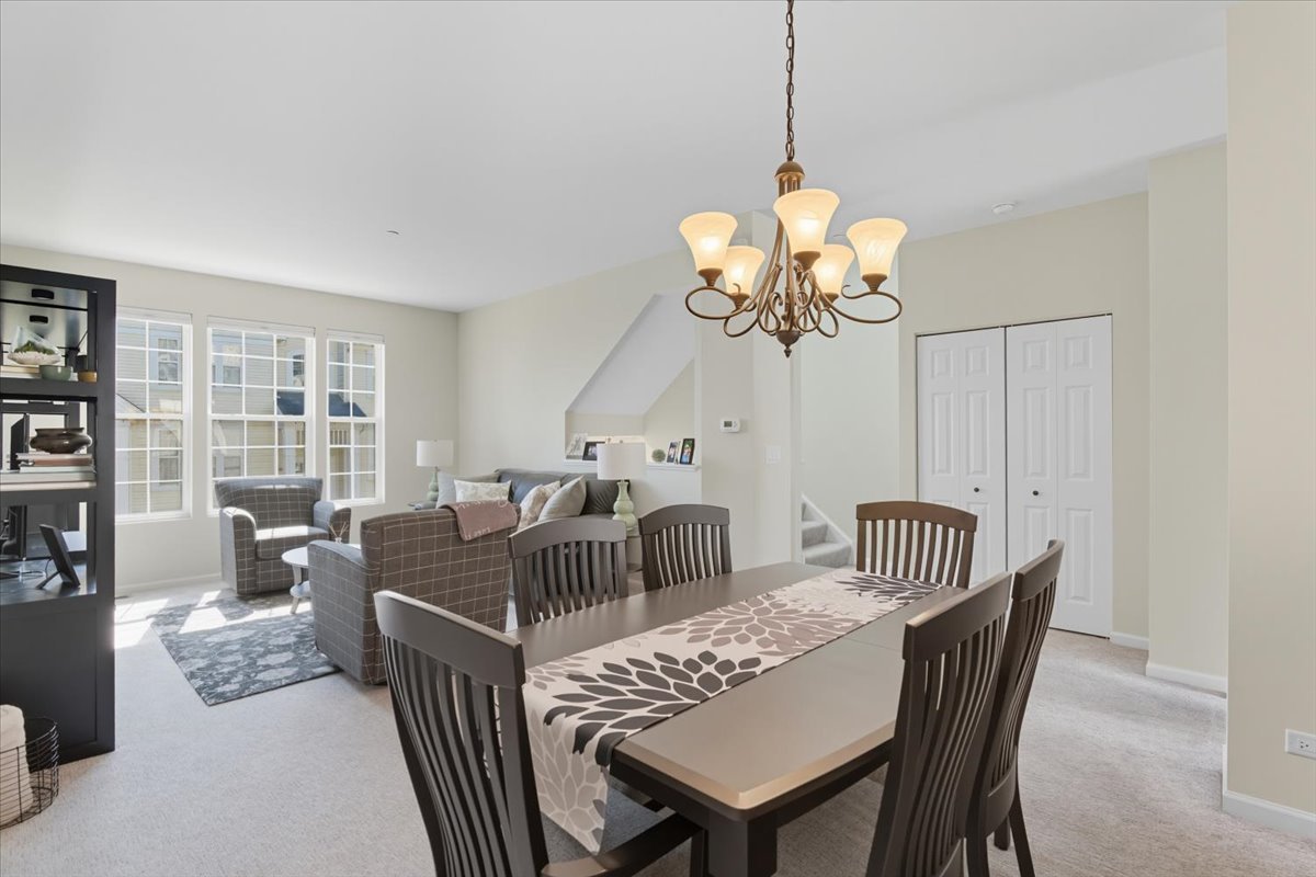 3077 Nicklaus Lane Wadsworth, IL 60083 - Photo 9 of 28 a view of a dining room with furniture window and outside view