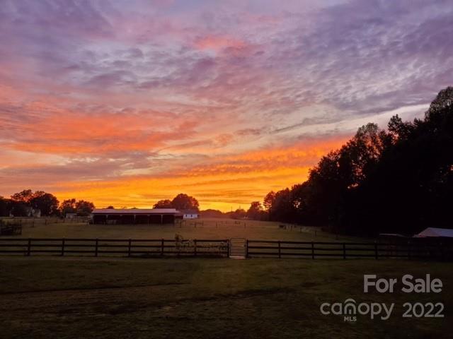 1825 Emanuel Church Road Rockwell, NC 28138 - Photo 13 of 21 a view of a street with sunset view