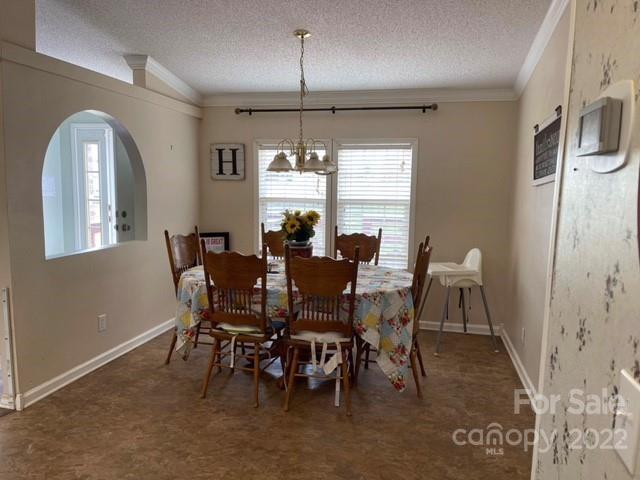 1825 Emanuel Church Road Rockwell, NC 28138 - Photo 19 of 21 a view of a dining room with furniture and window
