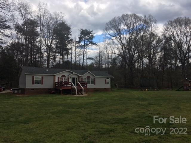 1825 Emanuel Church Road Rockwell, NC 28138 - Photo 6 of 21 a front view of a house with garden