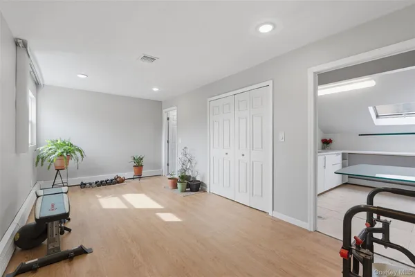 a view of storage and utility room with washer and dryer