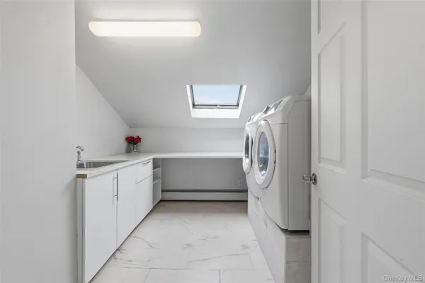 a bathroom with a sink and bathtub