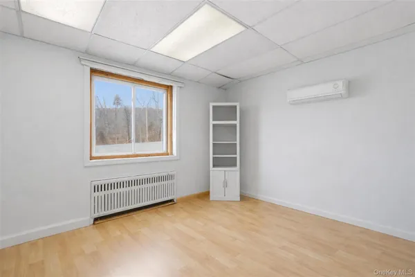 a room with furniture and window