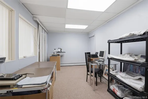 a room with furniture and a window