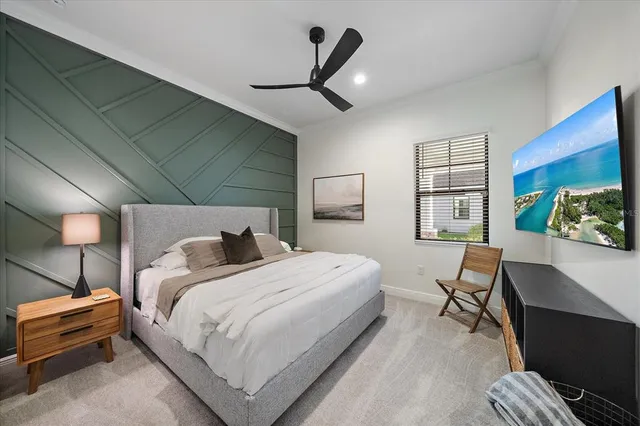 a view of a patio with table and chairs and potted plants
