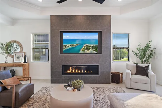 a kitchen with stainless steel appliances granite countertop a kitchen island a table and chairs