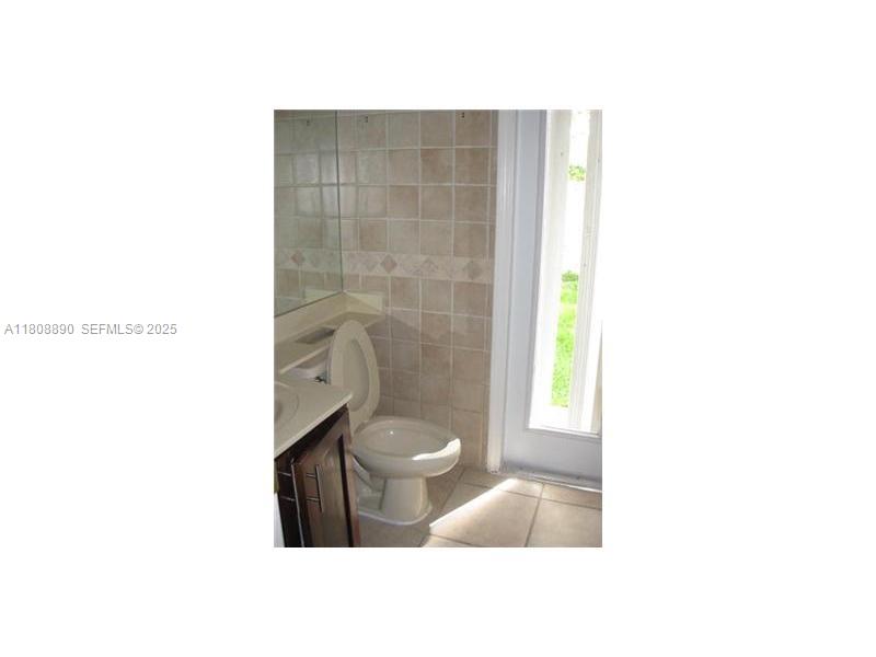 3985 Southwest 152nd Avenue Miramar, FL 33027 - Photo 17 of 26 a bathroom with a toilet and a shower