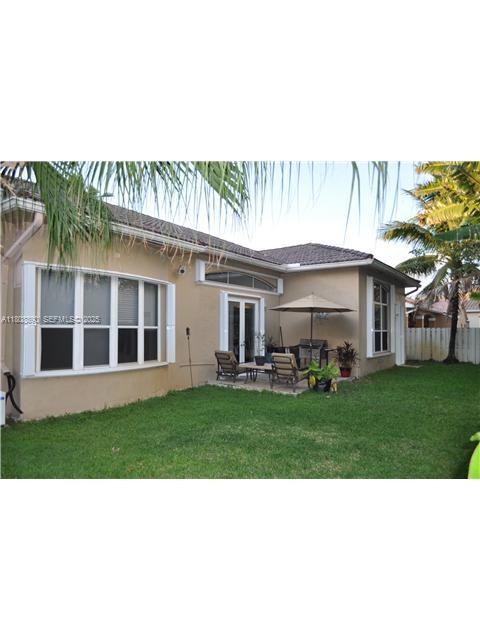 3985 Southwest 152nd Avenue Miramar, FL 33027 - Photo 25 of 26 a black and white photo of a house