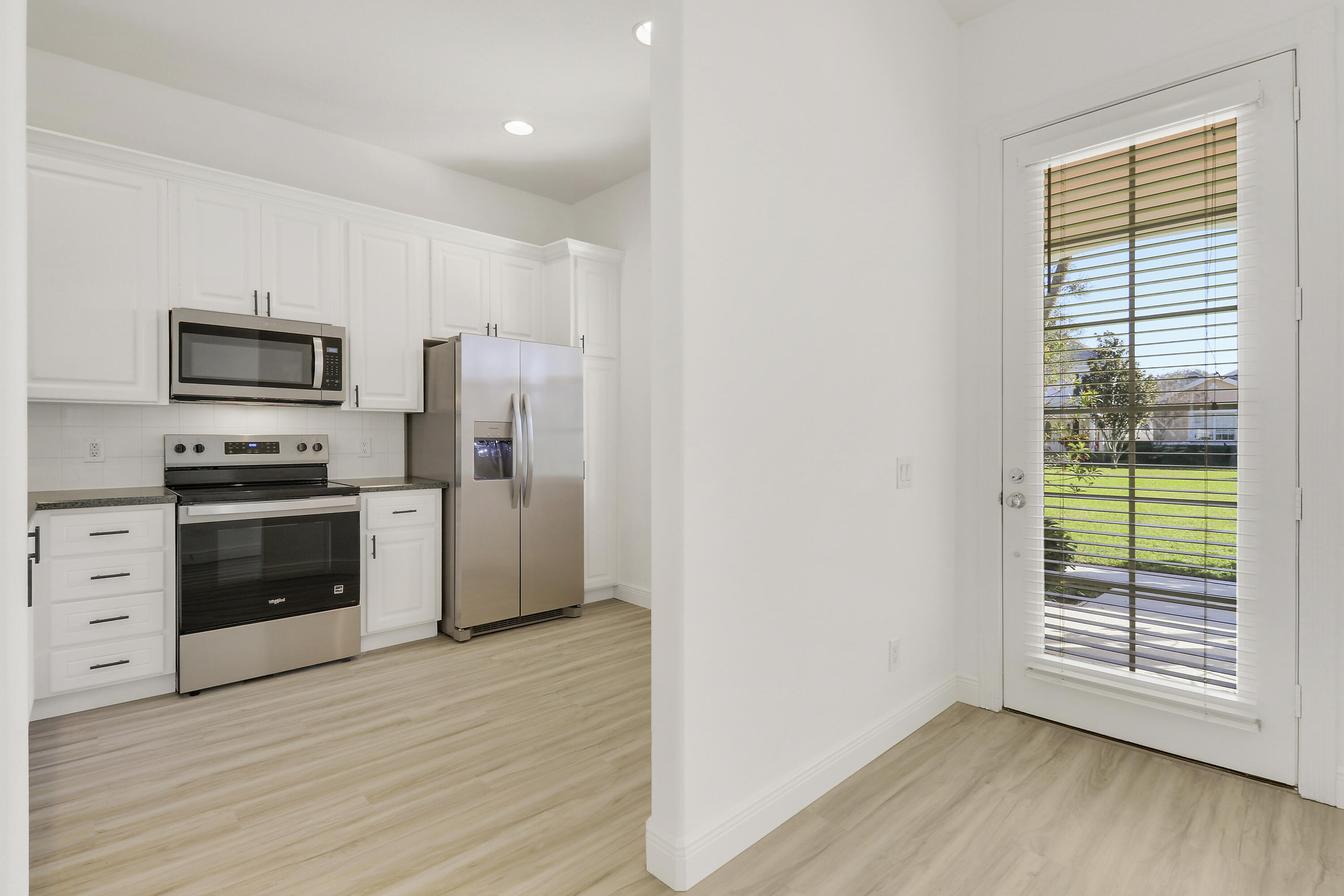 229 Sugar Apple Way Jupiter, FL 33458 - Photo 9 of 46 Kitchen & Foyer