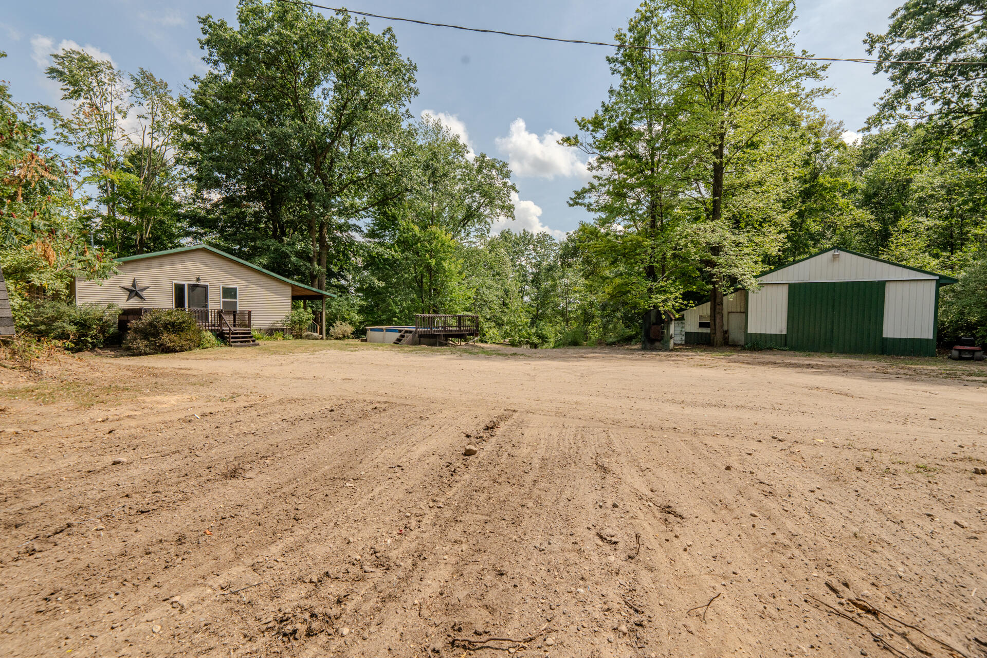 2665 22 Mile Road Barryton, MI 49305 - Photo 1 of 59 Home Barn Driveway
