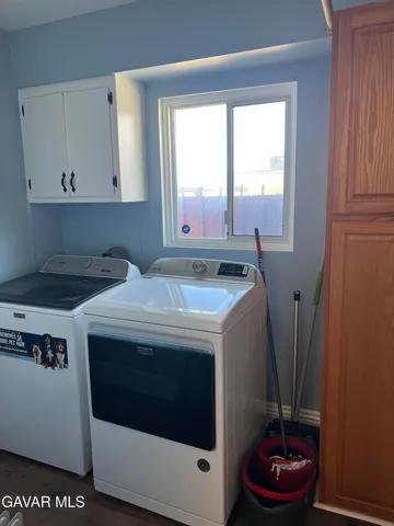 view of an empty room with wooden floor