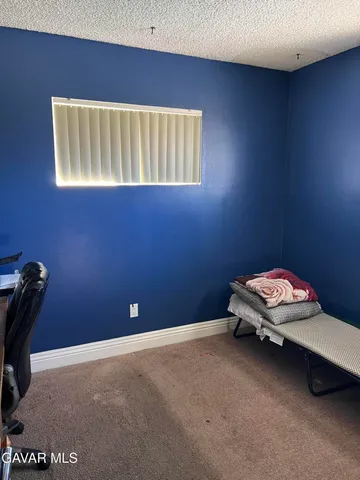 a room with a small space and a wooden floor