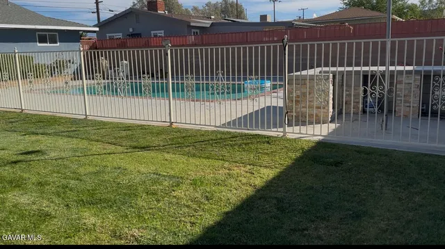 a view of a backyard with a garden