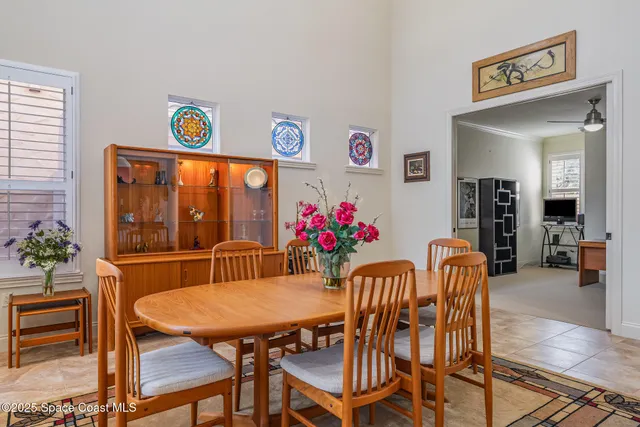 a kitchen with stainless steel appliances granite countertop a kitchen island hardwood floor sink stove and granite counter top