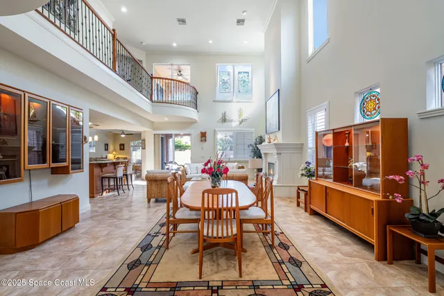 a kitchen with granite countertop stainless steel appliances white cabinets and a stove a oven with granite countertops