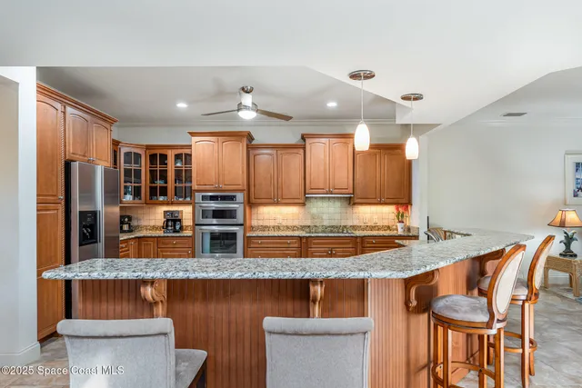 a view of a living room and windows