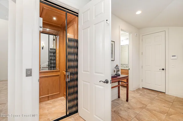 a living room with fireplace furniture and a fireplace