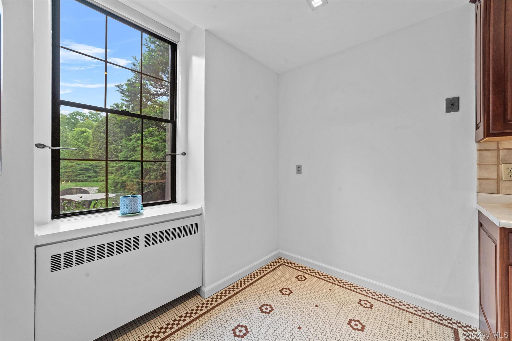 341 Furnace Dock Road, Unit 5 Cortlandt Manor, NY 10567 - Photo 13 of 41 a view of an empty room and window
