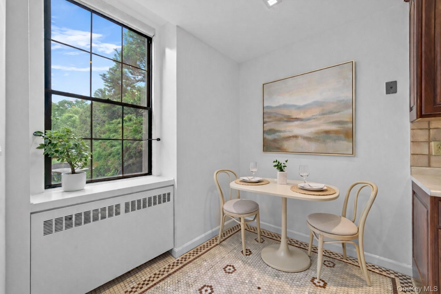 341 Furnace Dock Road, Unit 5 Cortlandt Manor, NY 10567 - Photo 14 of 41 a dining room with furniture and window