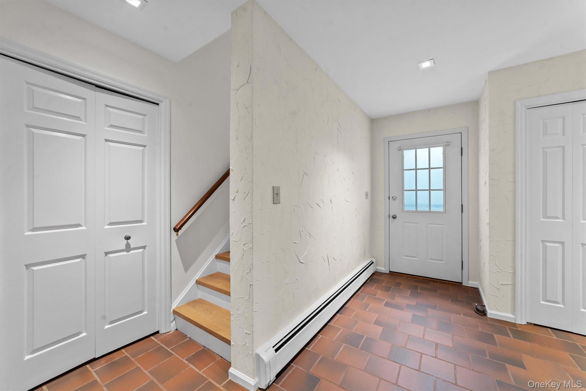 341 Furnace Dock Road, Unit 5 Cortlandt Manor, NY 10567 - Photo 15 of 41 a view of an entryway with staircase