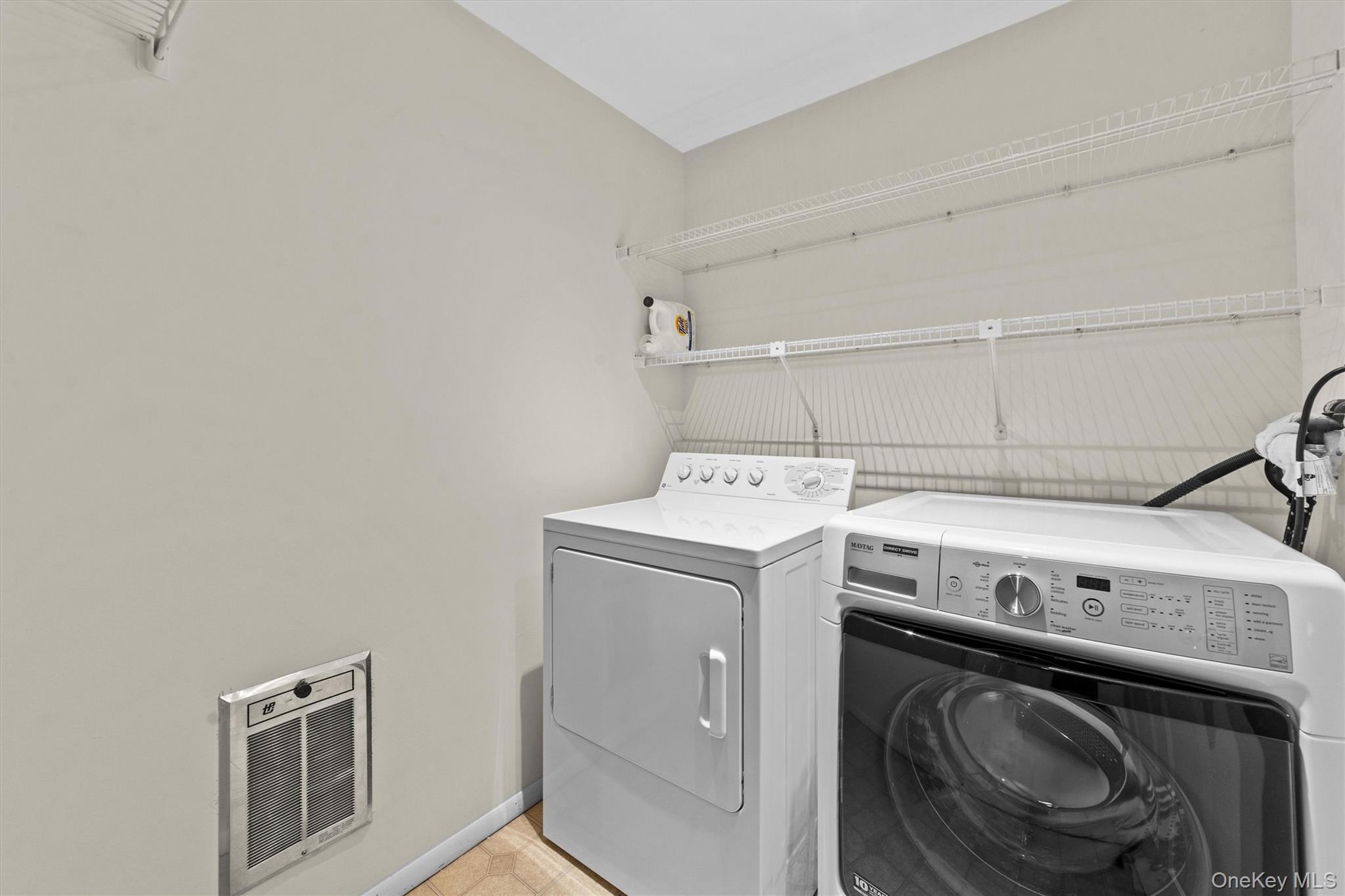 341 Furnace Dock Road, Unit 5 Cortlandt Manor, NY 10567 - Photo 17 of 41 a utility room with dryer and washer