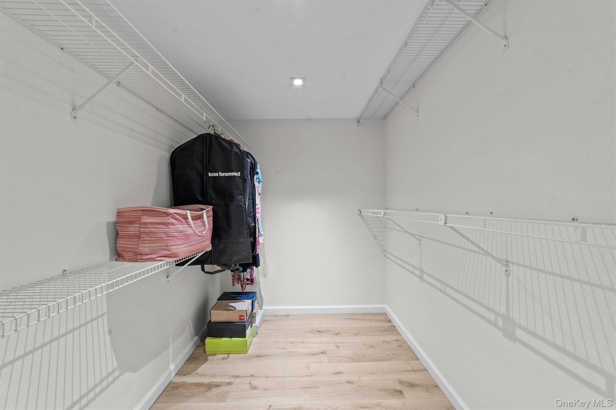 341 Furnace Dock Road, Unit 5 Cortlandt Manor, NY 10567 - Photo 20 of 41 a view of storage and utility room with wooden floor