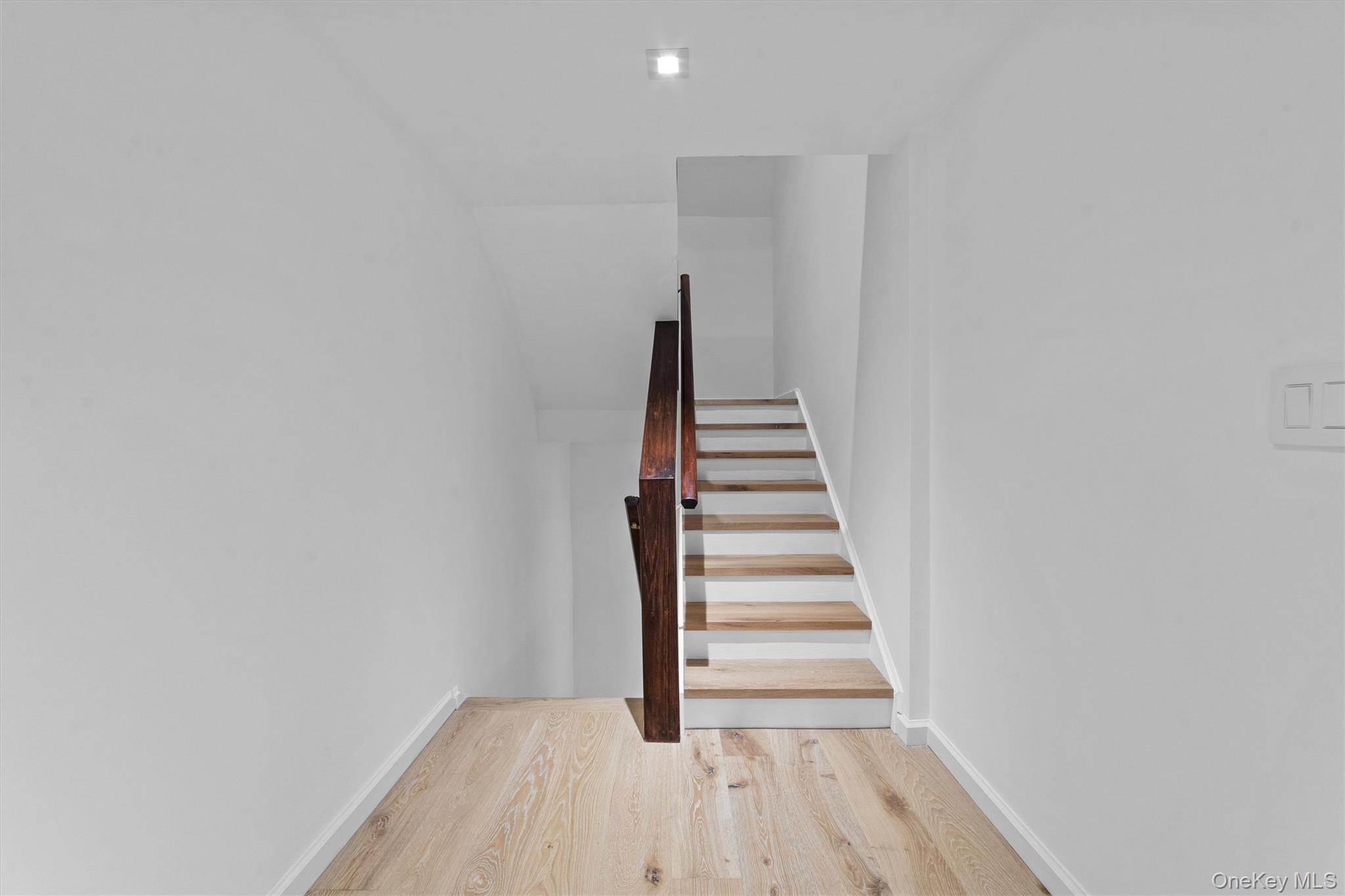 341 Furnace Dock Road, Unit 5 Cortlandt Manor, NY 10567 - Photo 23 of 41 a view of entryway with wooden floor
