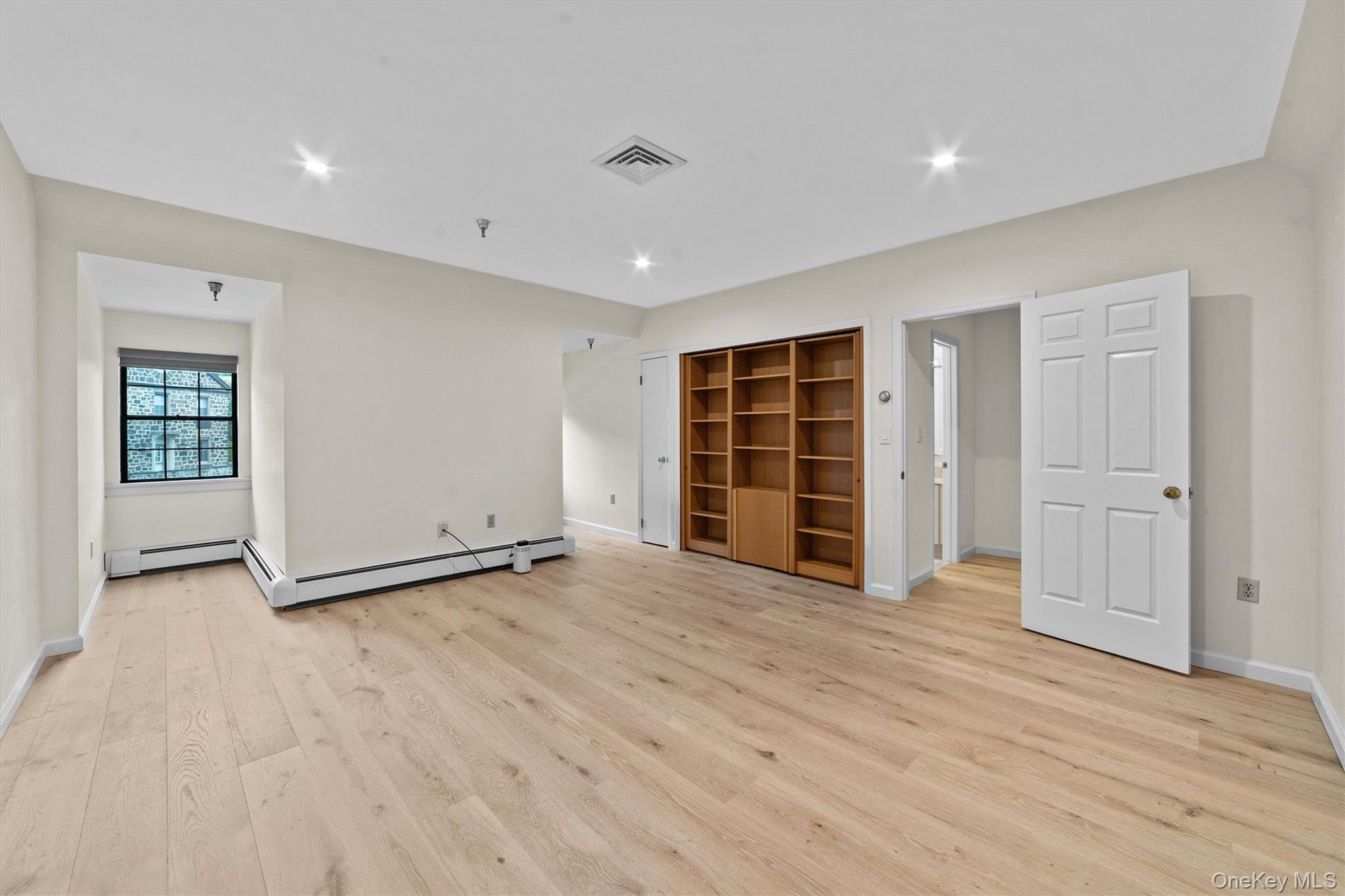 341 Furnace Dock Road, Unit 5 Cortlandt Manor, NY 10567 - Photo 24 of 41 a view of an empty room with closet and workspace