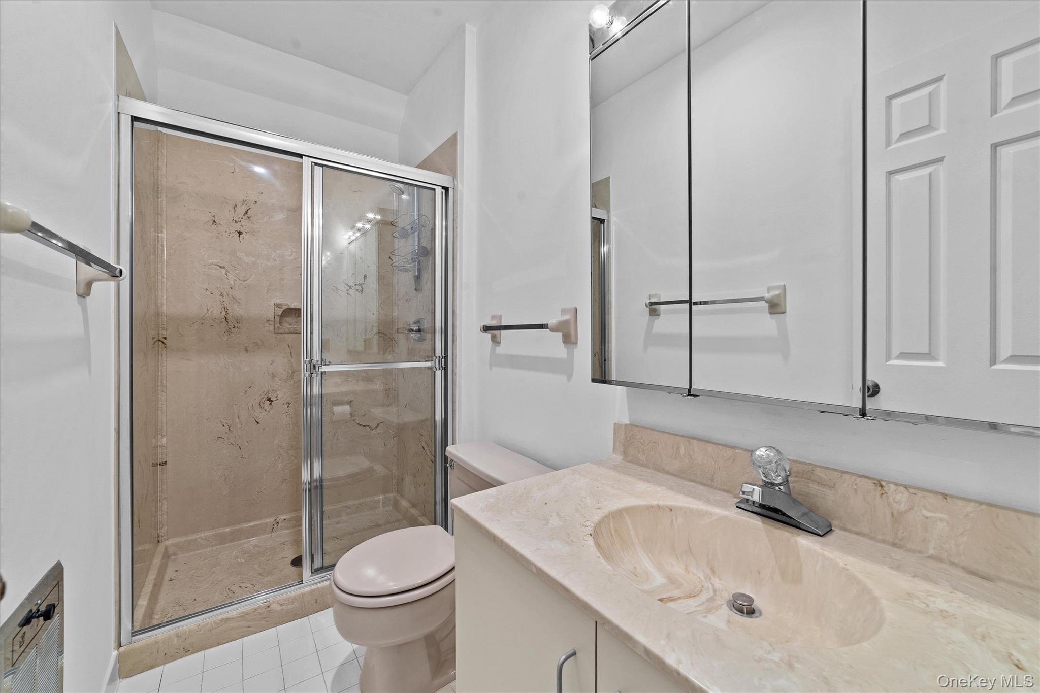 341 Furnace Dock Road, Unit 5 Cortlandt Manor, NY 10567 - Photo 27 of 41 a bathroom with a sink toilet and shower