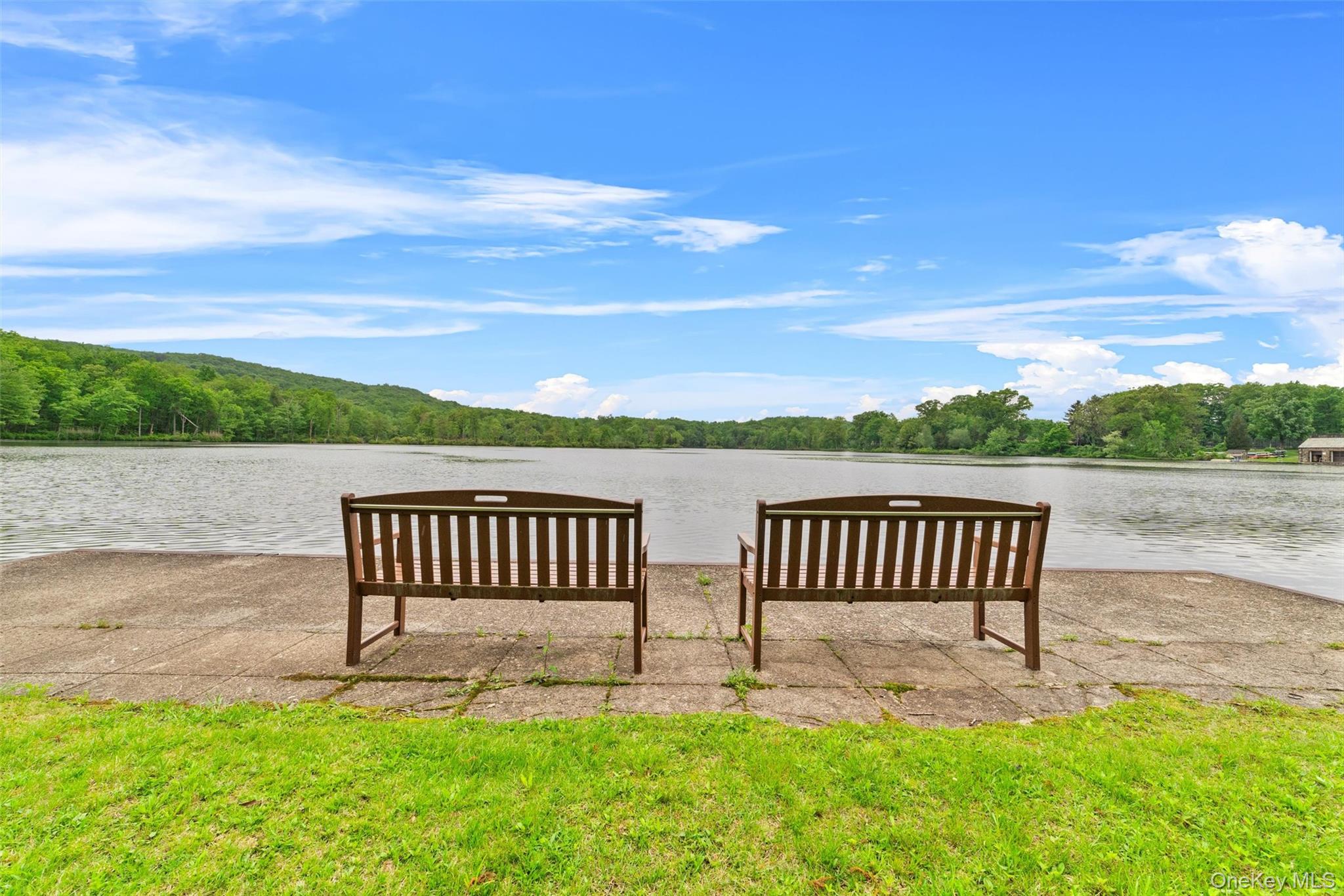 341 Furnace Dock Road, Unit 5 Cortlandt Manor, NY 10567 - Photo 36 of 41 a view of a bench in backyard
