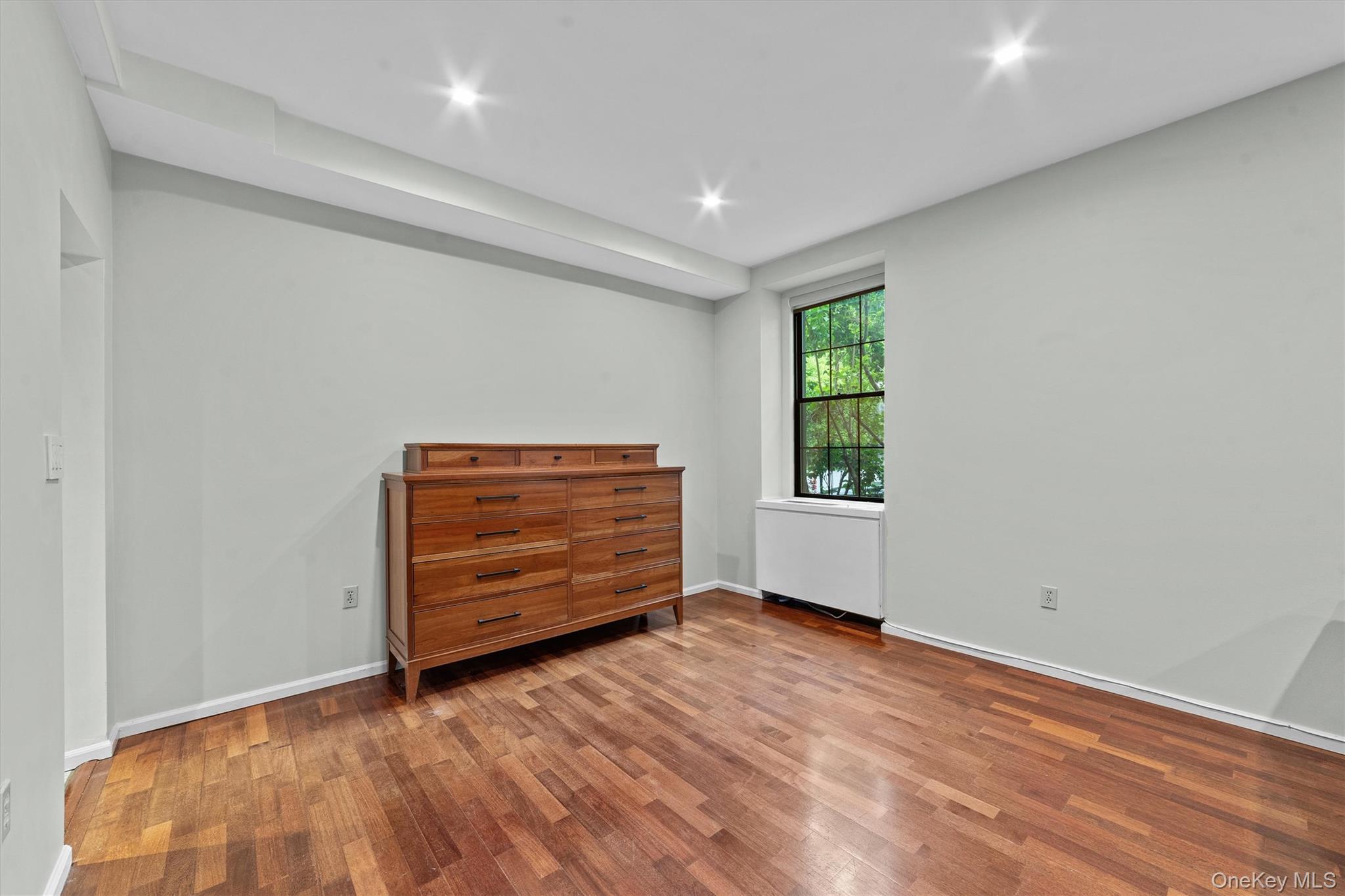 341 Furnace Dock Road, Unit 5 Cortlandt Manor, NY 10567 - Photo 9 of 41 a view of an empty room with a window