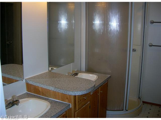 263 Harris Road Lexington, NC 27292 - Photo 14 of 16 Master Bath/Spa. Large master bath with garden tub, double sinks, and separate shower.