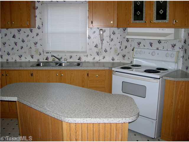 263 Harris Road Lexington, NC 27292 - Photo 7 of 16 Kitchen. Like to cook...you can certainly do it in this spacious kitchen.