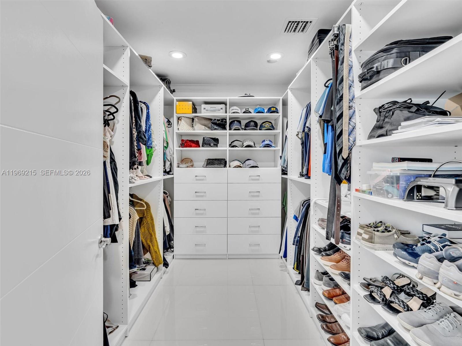 5121 Northeast 30th Terrace Lighthouse Point, FL 33064 - Photo 44 of 67 Primary Bedroom walk in closet