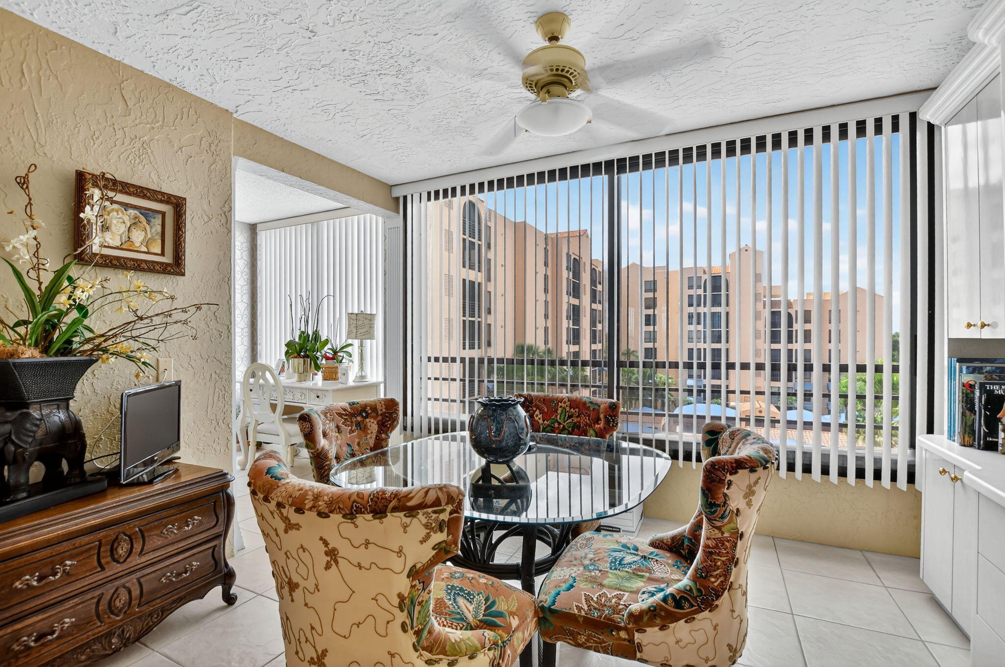 7178 Promenade Drive, Unit 502 Boca Raton, FL 33433 - Photo 11 of 33 a living room with furniture and a potted plant
