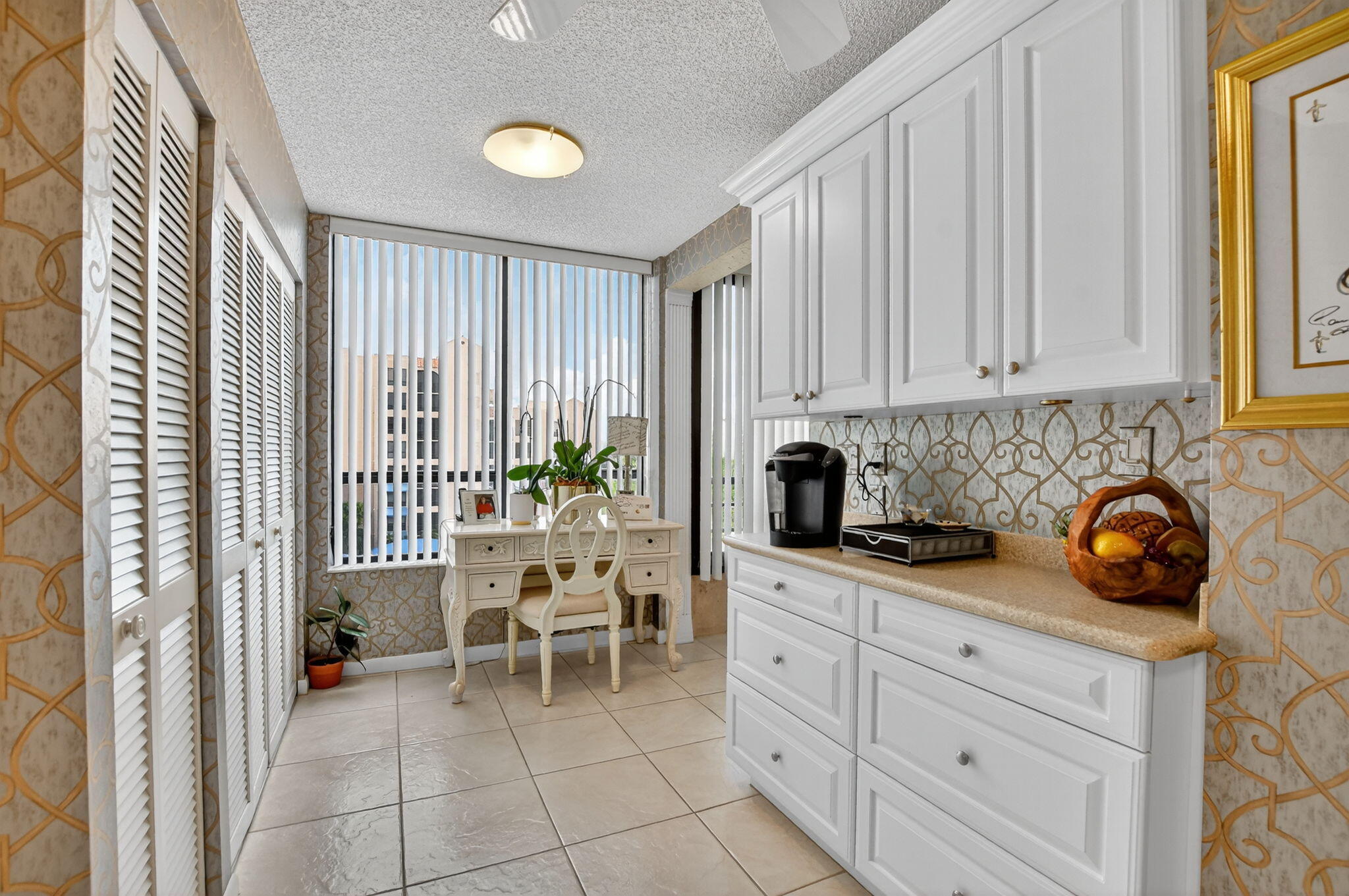 7178 Promenade Drive, Unit 502 Boca Raton, FL 33433 - Photo 14 of 33 a view of a kitchen with furniture and staircase