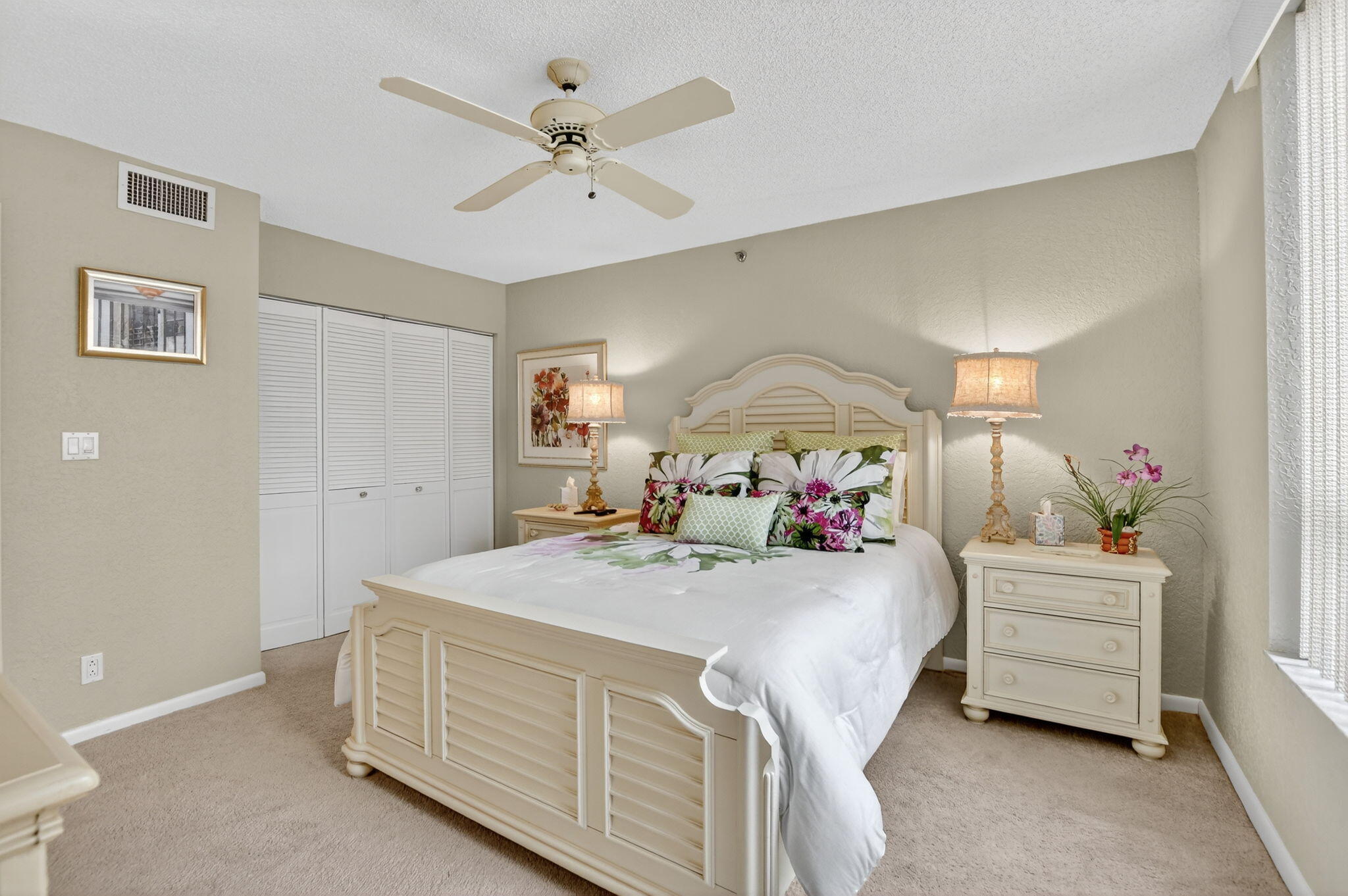 7178 Promenade Drive, Unit 502 Boca Raton, FL 33433 - Photo 26 of 33 a en suite bathroom with a double vanity sink and a mirror
