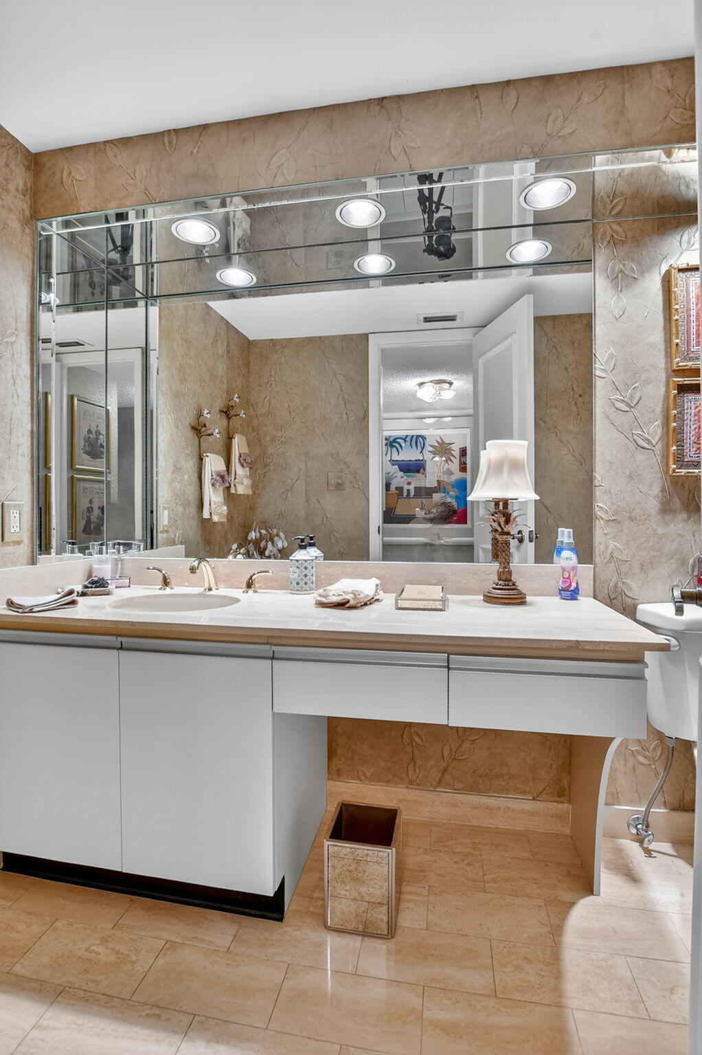 7178 Promenade Drive, Unit 502 Boca Raton, FL 33433 - Photo 29 of 33 a bathroom with a sink and a mirror