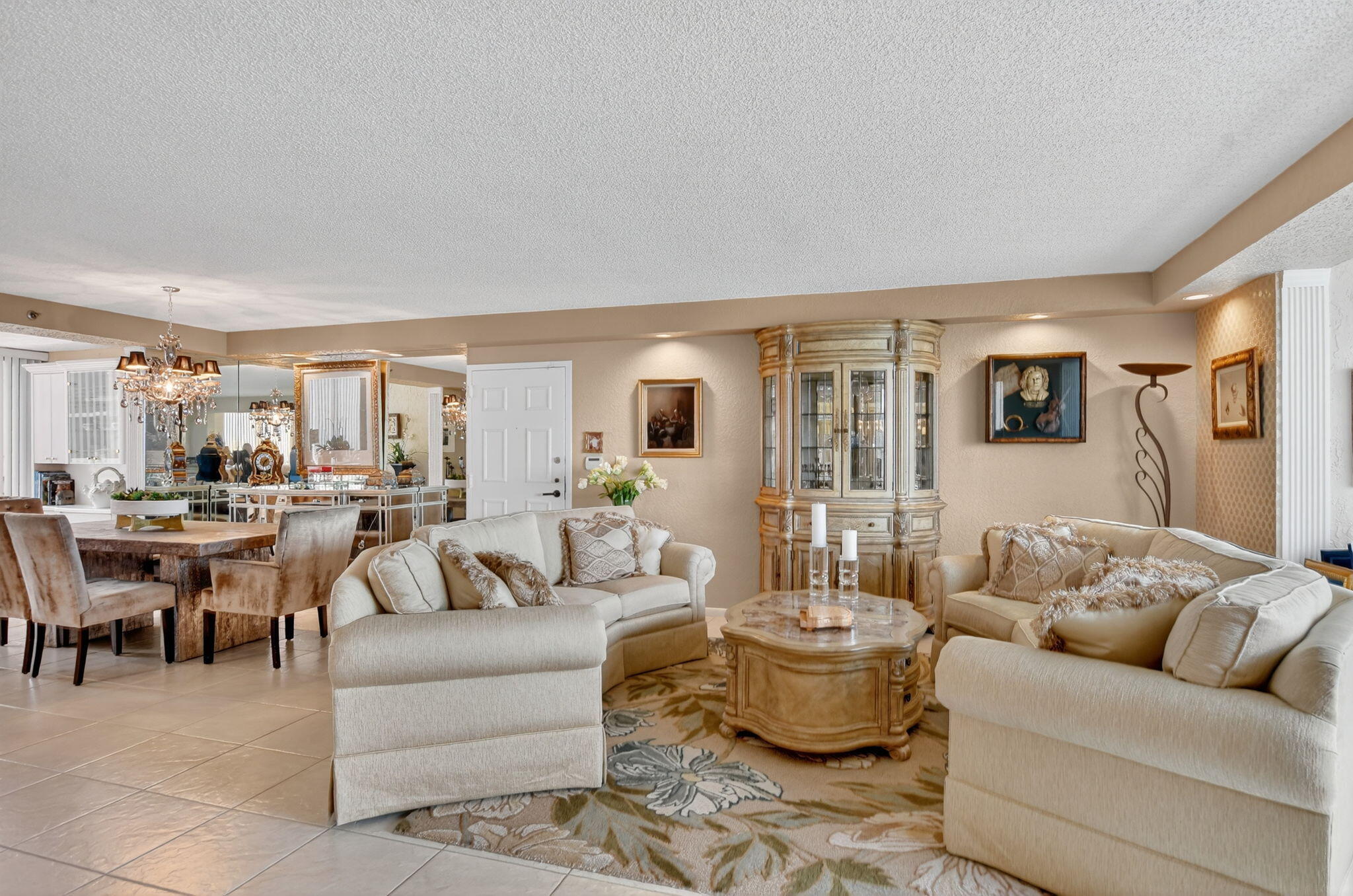 7178 Promenade Drive, Unit 502 Boca Raton, FL 33433 - Photo 3 of 33 a living room with furniture and view of kitchen