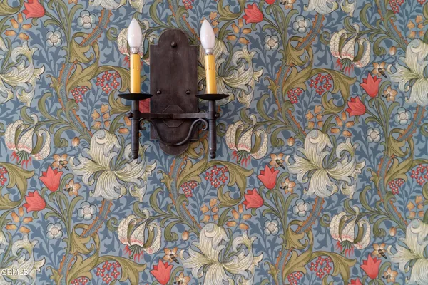 a view of cabinets and wooden floor