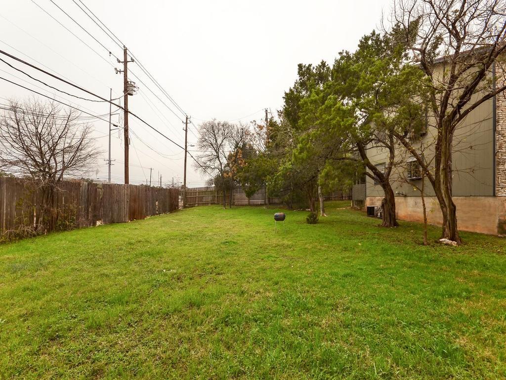 4300 Acropolis Court, Unit A Austin, TX 78759 - Photo 11 of 14 View of fenced backyard