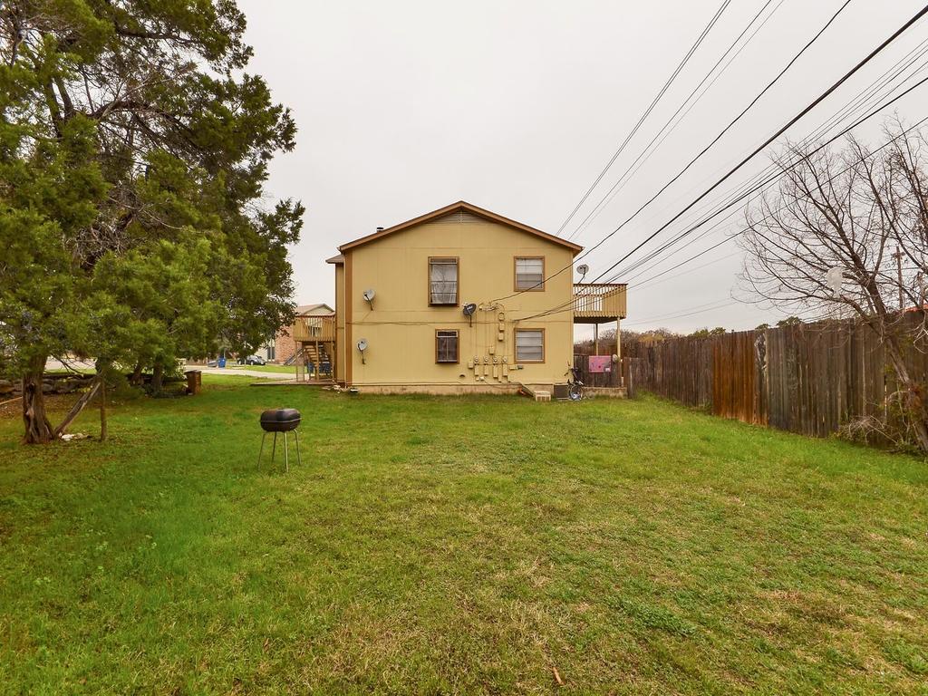 4300 Acropolis Court, Unit A Austin, TX 78759 - Photo 12 of 14 Rear view of property