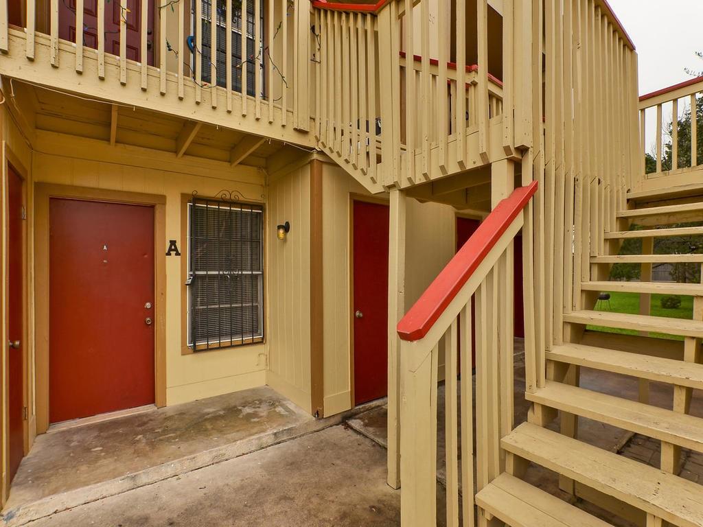4300 Acropolis Court, Unit A Austin, TX 78759 - Photo 2 of 14 Doorway to property with a patio area