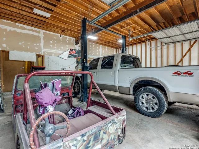 a view of a tree with a yard